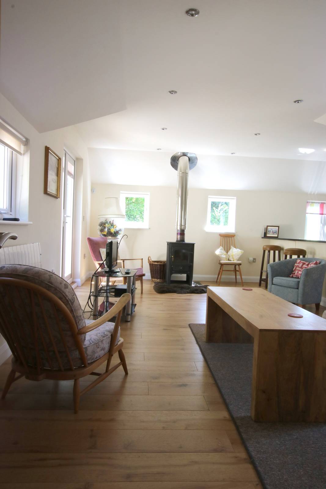 image shows: The spacious lounge/dining room has a lovely light and airy feel