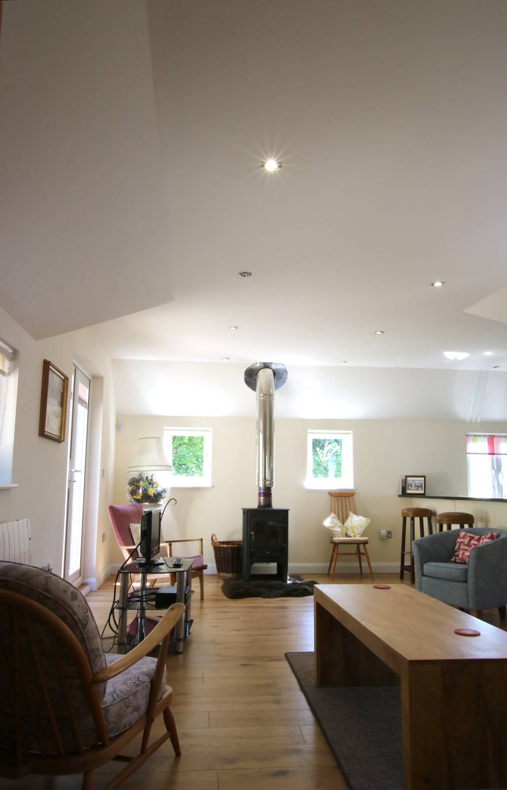 image shows: The spacious lounge/dining room has a lovely light and airy feel